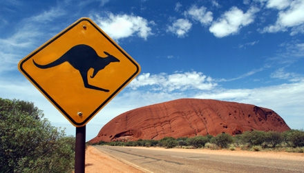 Ayres Rock, Australia: A Kangaroo warning road sign in the desert near Uluru